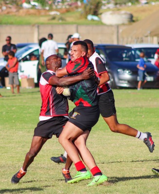 There were some massive collisions at the Fabian Juries Community Fun Day, including this one in the match between the Tyantyi Rangers and the Six SAI Leopards. Photo: Stephen Kisbey-Green