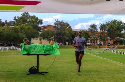 The overall winner of the Makana Brick Nite race, Lubabalo Bokuva, crossing the finish line on Wednesday 6 March. Photo: Stephen Kisbey-Green