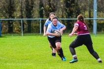 Katie O'Brien tucks the ball in for a big carry. Photo: Stephen Kisbey-Green