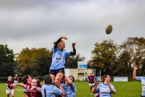 Sophie Kilburn looks back as the ball flies overhead. Photo: Stephen Kisbey-Green