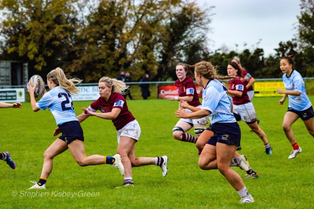 Aine McGroarty carries well with Leah Reilly and Kirara Kirasha in support. Photo: Stephen Kisbey-Green