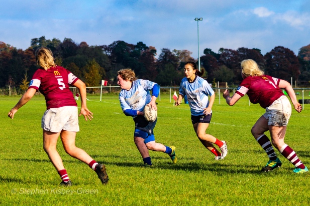 Niamh Tester looks to offload. Photo: Stephen Kisbey-Green