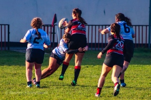 Louise McCleery puts in a big hit against Tullamore’s hooker. Photo: Stephen Kisbey-Green