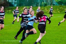 Leah Reilly on the attack for DCU against Old Belvedere RFC. Photo: Stephen Kisbey-Green