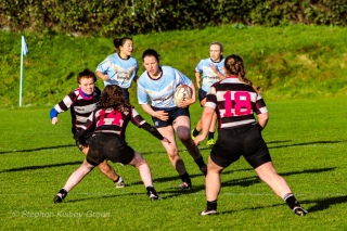 DCU run into a strong tackle from Old Belvedere RFC. Photo: Stephen Kisbey-Green