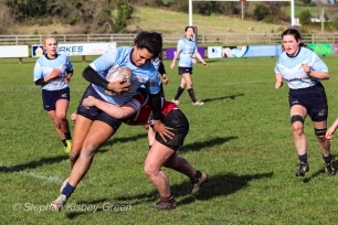 Eimear Corri brushes off a poor tackle from Wicklow, as she looks to add to her try tally. Photo: Stephen Kisbey-Green